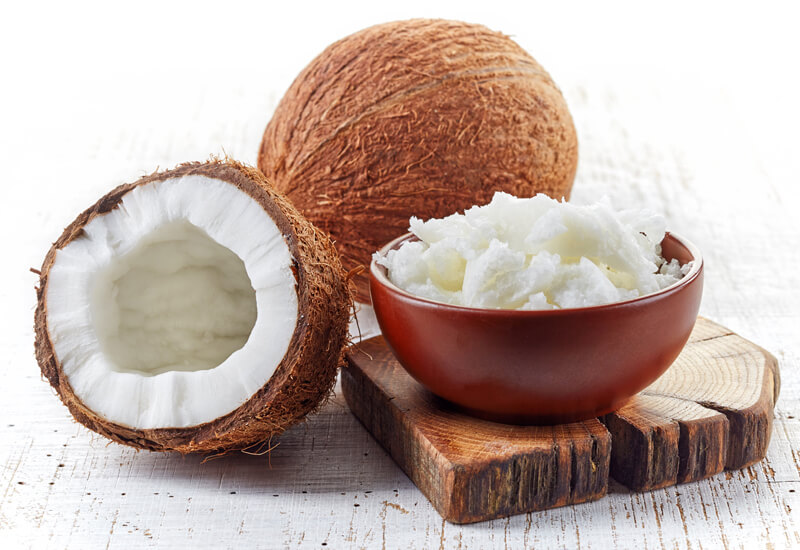 coconut on table broken in half