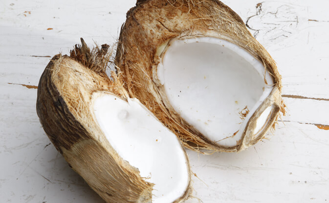 raw cooconut cut in half