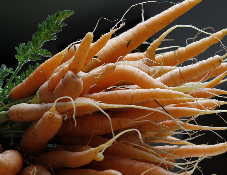 organic bunch of leafy greens carrots