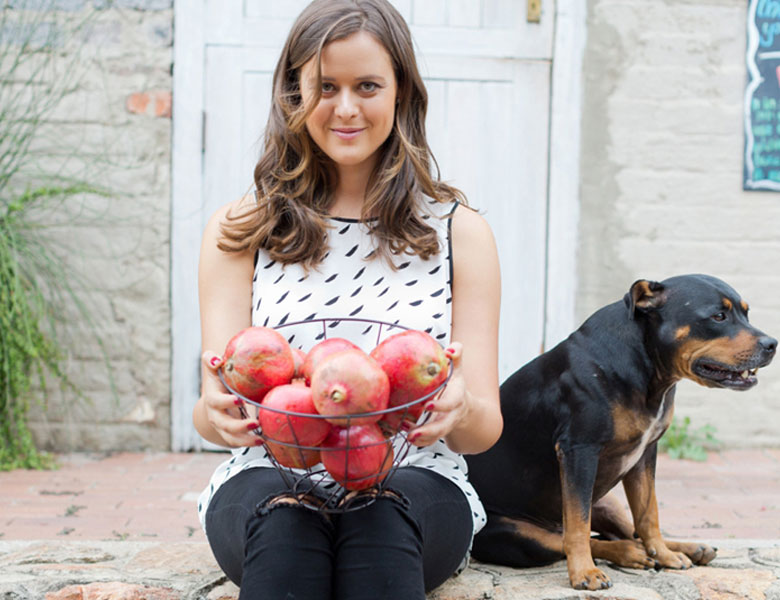 Antonia with apples and her dog